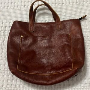 Portland Leather tote with crossbody strap.  NEVER used.  Perfect condition.